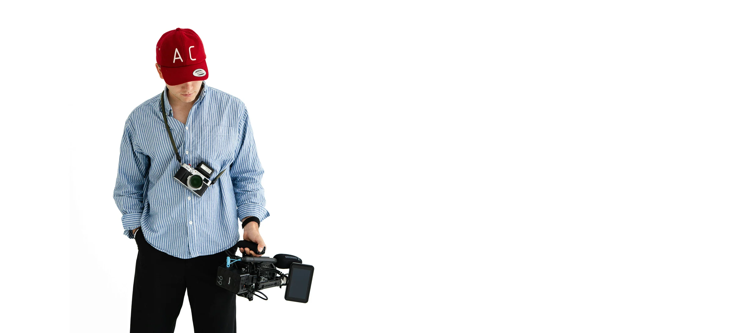 Carl Gebhard in the studio, seated beside his camera rig